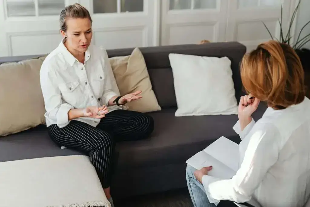 Therapist and patient talking